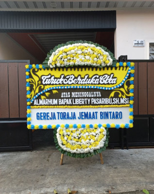 Papan Bunga Duka di Tanah Putih